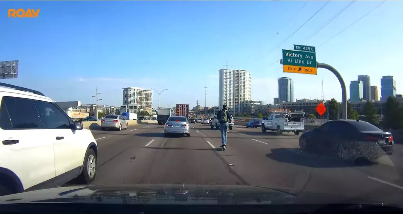 Lime Scooter Rider Takes on I35 In Dallas Dallas Observer