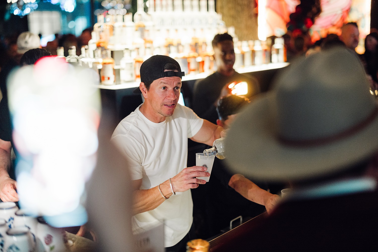 Photos: Mark Wahlberg Braved Nasty Dallas Weather and Served Shots at La Neta