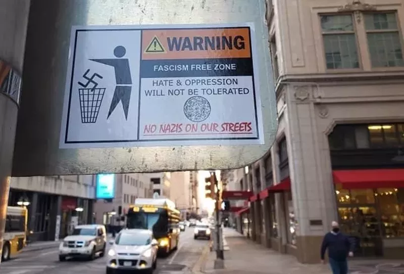 Image: Dallasites are posting these stickers around the city to cover up white supremacist propaganda