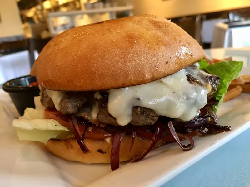 Image: The griddle cheeseburger with a thick blanket of smoked cheddar is $10 (with fries).