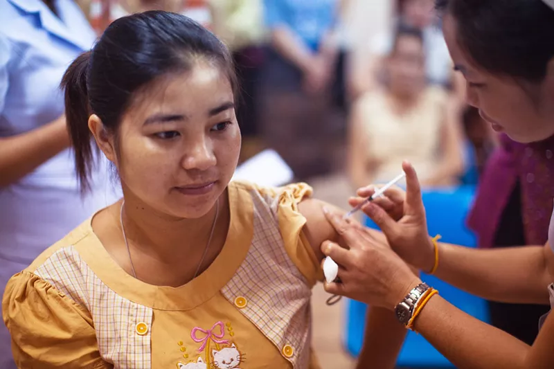 Image: Many undocumented immigrants don't realize they can receive a COVID-19 vaccine for free.