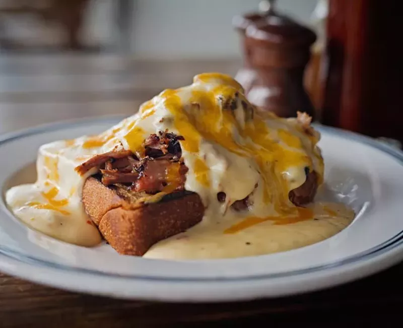 Image: Chipped beef on toast — salted brisket with smoked cheddar and white gravy.