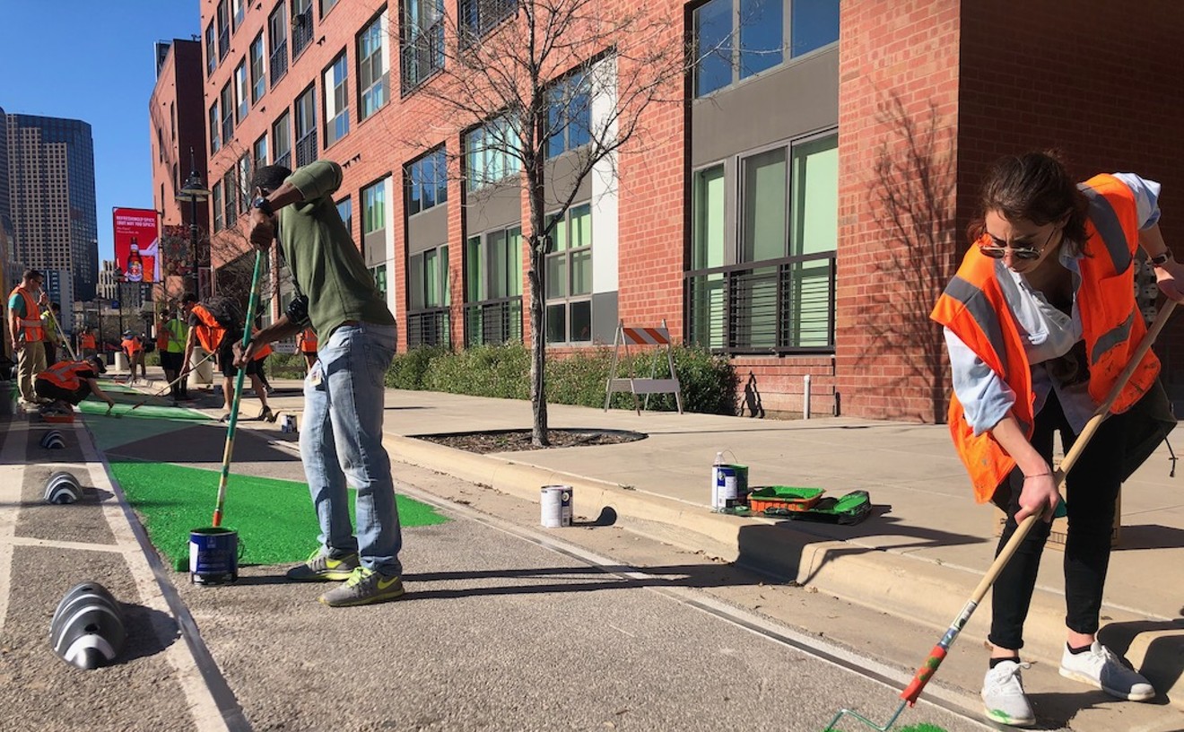 Volunteers Add Some Pizzazz to Pioneering Downtown Bike Lane