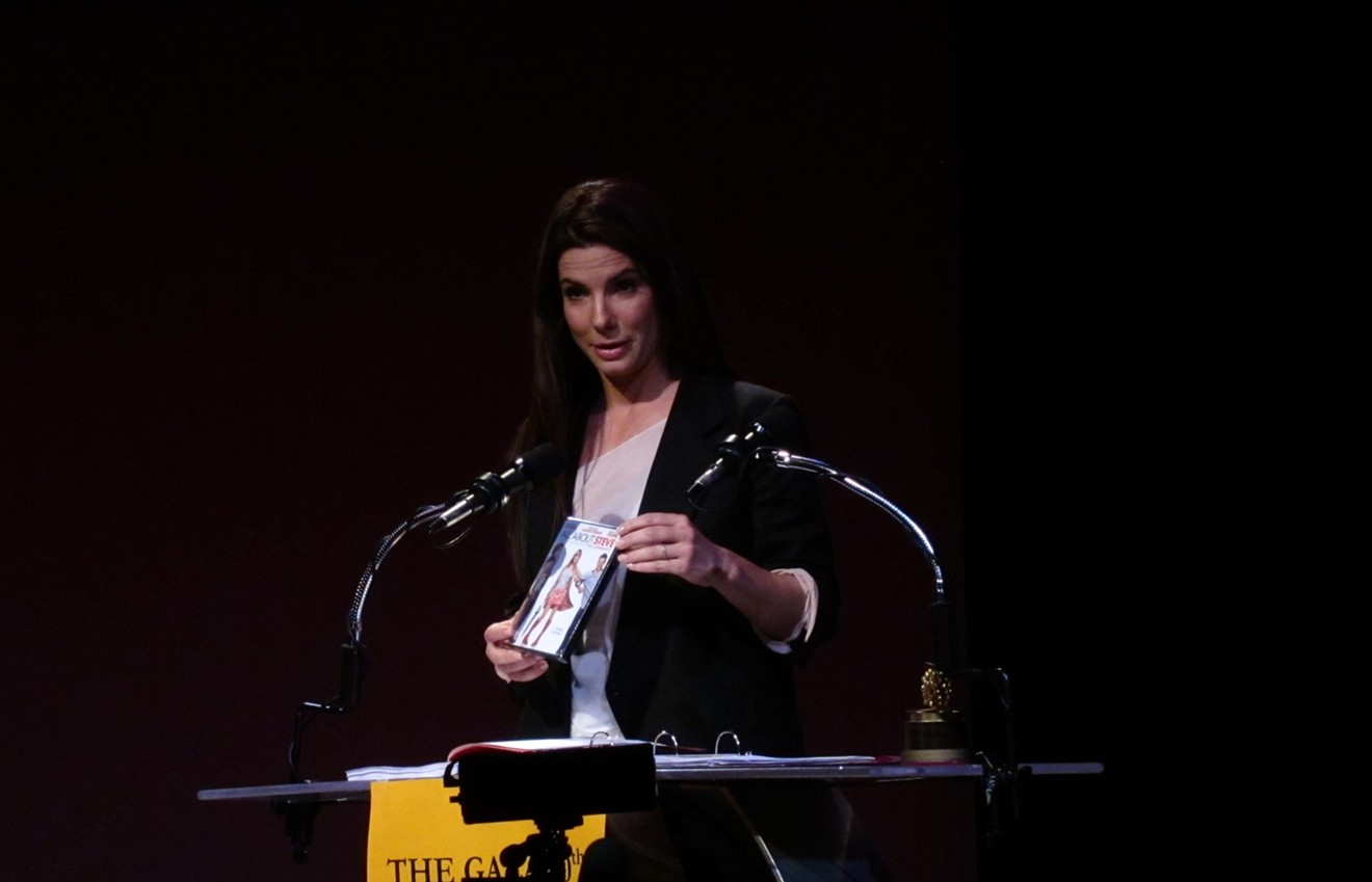 Sandra Bullock receiving a Best Actress award at the 2010 Razzies for All About Steve.
