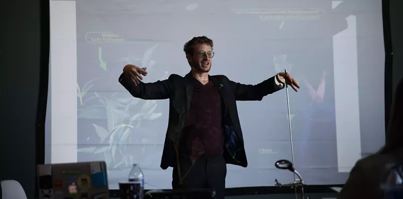 Image: Max Montrose giving a lecture on cannabis in Austin