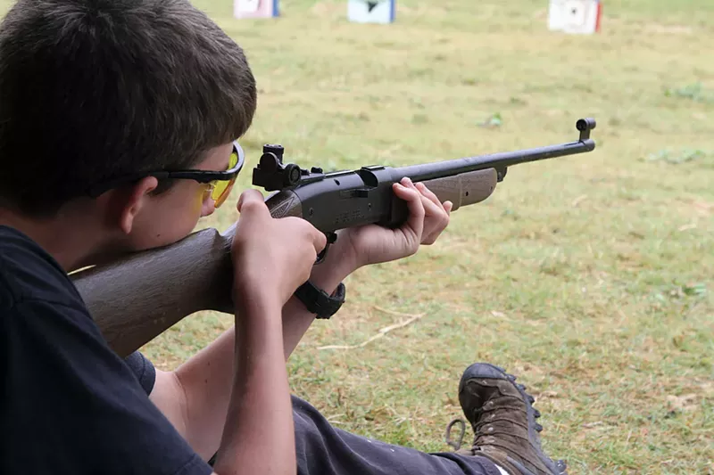 Image: A Boy Scout learns safe marksmanship.