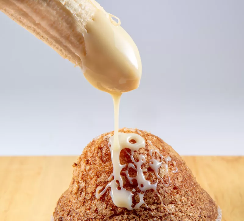 Image: banana with cream drizzling on a muffin