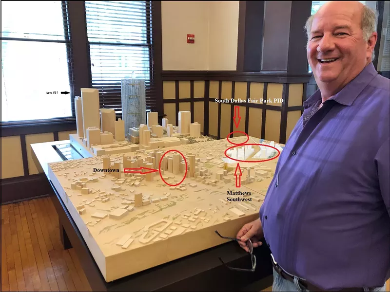 Image: Dale Davenport admires a certain architectural model he came across last year in the offices of developers Matthews Southwest. The South Dallas Fair Park PID (noted on model) is a special taxing district Davenport helped create, now taken over by a Matthews-run nonprofit.