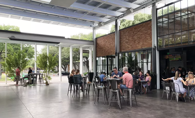 Image: Every Sunday at Wheelhouse, a DJ spins vinyl while Dallasites brunch on bloody marys and fried green tomato Benedicts in the open-air courtyard.