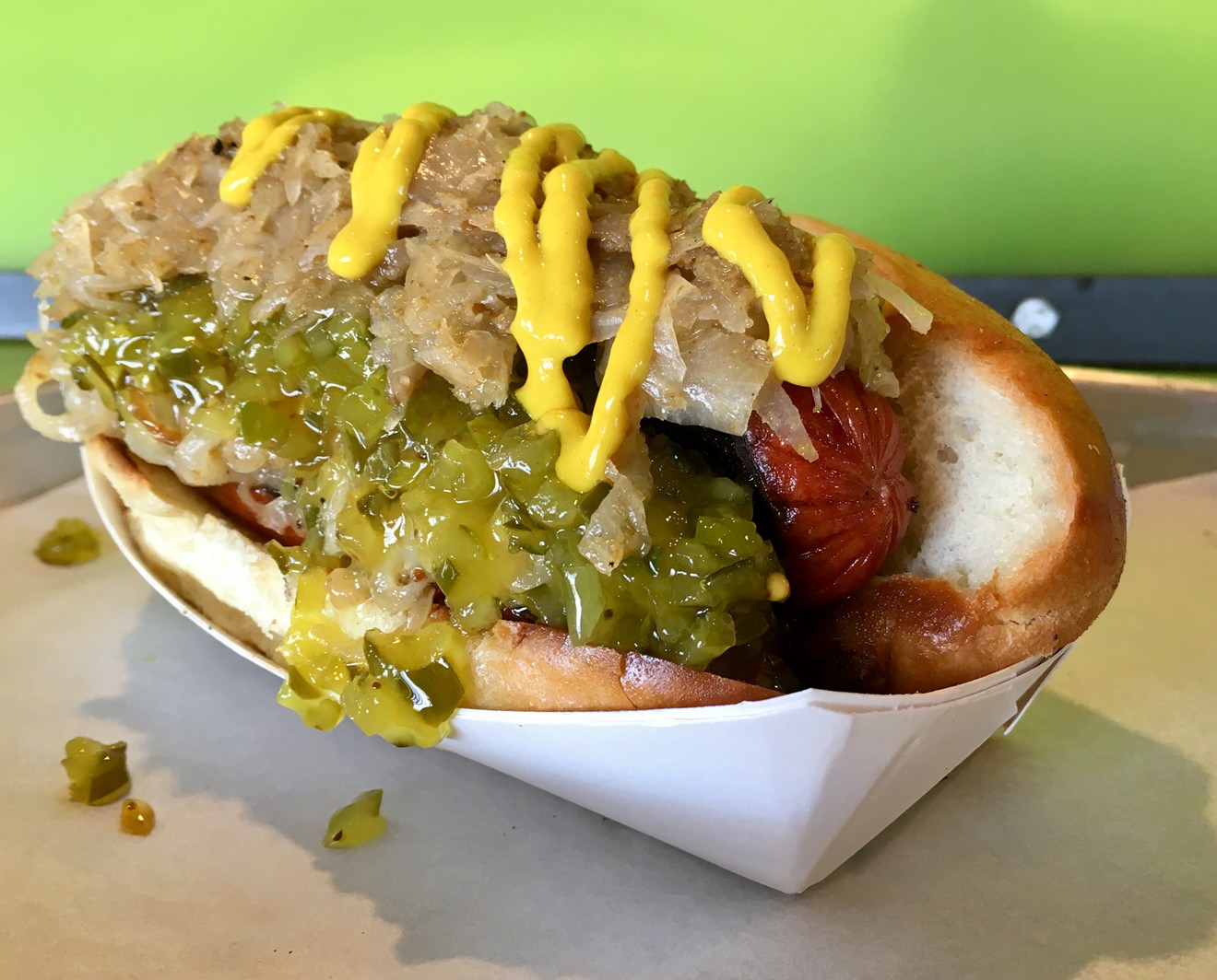 Tender, nutmeg-forward sauerkraut, griddled onions and relish top the Sidecar dog at Pints & Quarts ($6.25).
