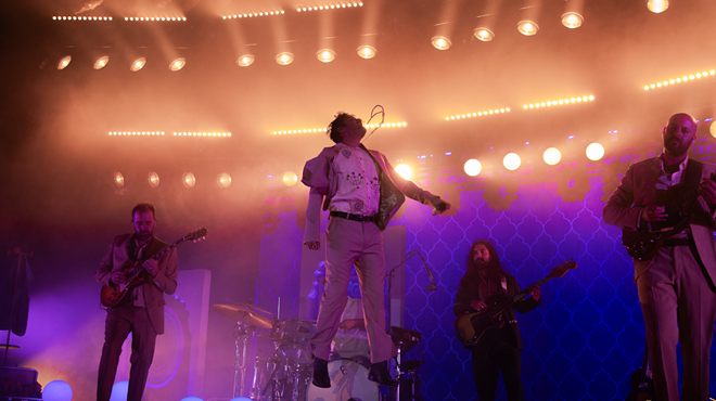 Band playing on stage in the evening