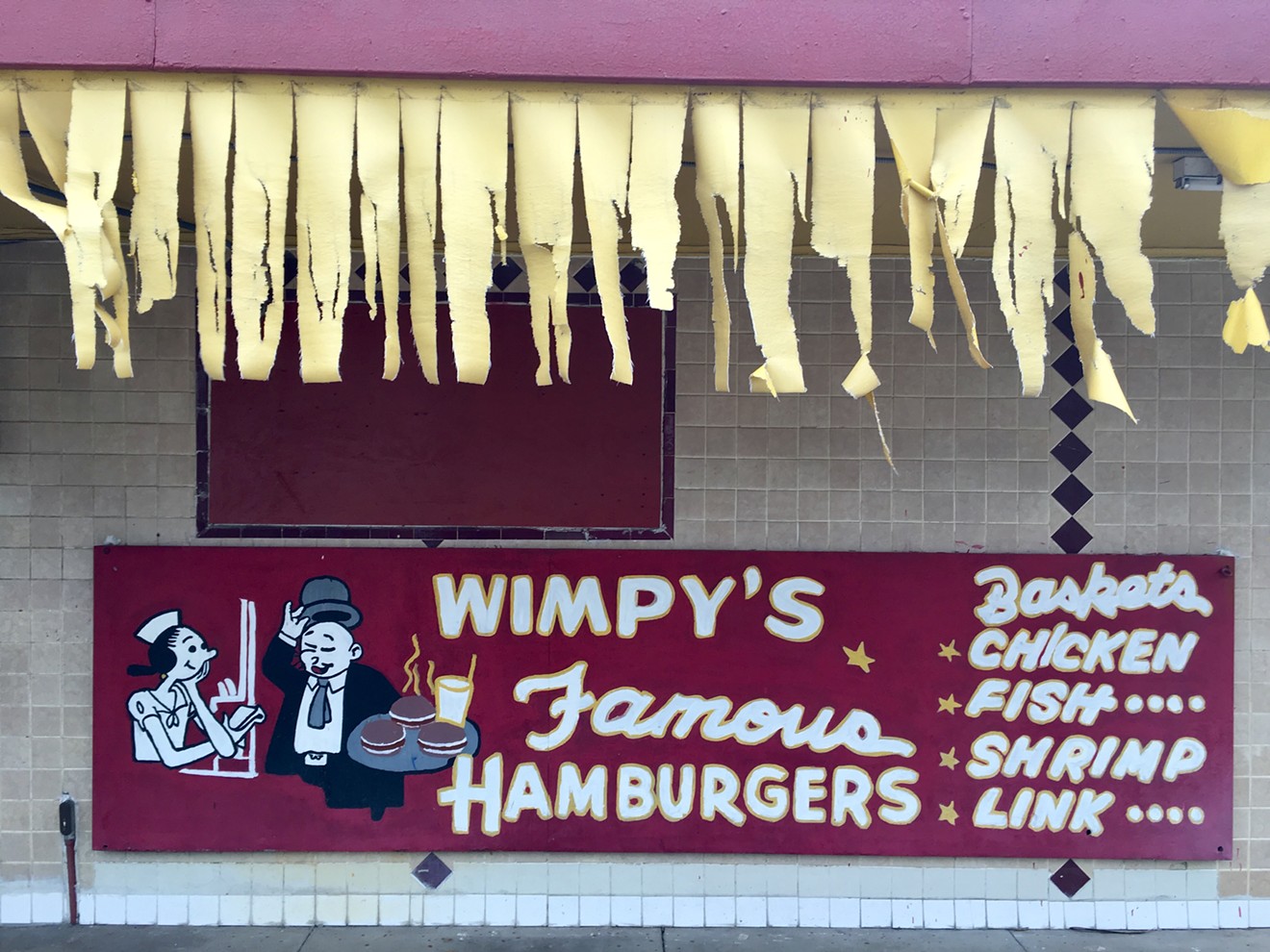 Eating in your car at Wimpy's, West Dallas' decades-old cheap burger joint, is a pure thing.