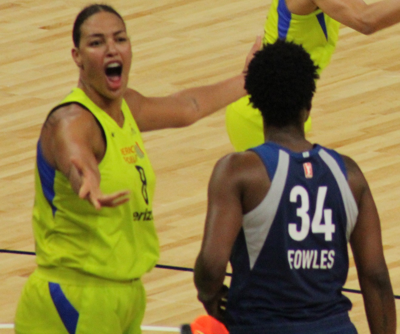 Dallas Wings center Liz Cambage (left) has broken a WNBA record by scoring 53 points in one game.