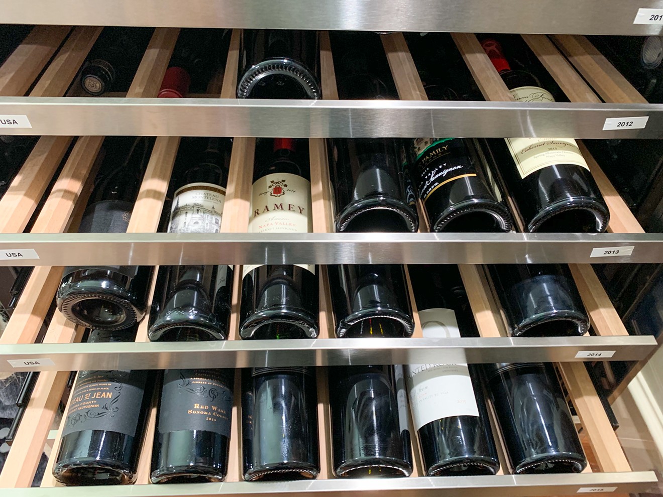 If you're looking to keep a solid stock of wine, just in case, fill it up with wines you buy in your own city.