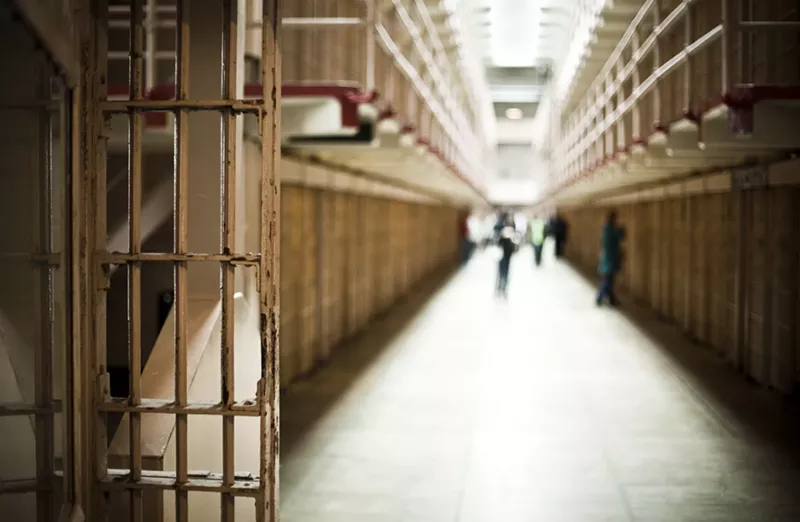 Image: The pandemic's effect on courts means longer waits in jail for defendants who can't afford bail.