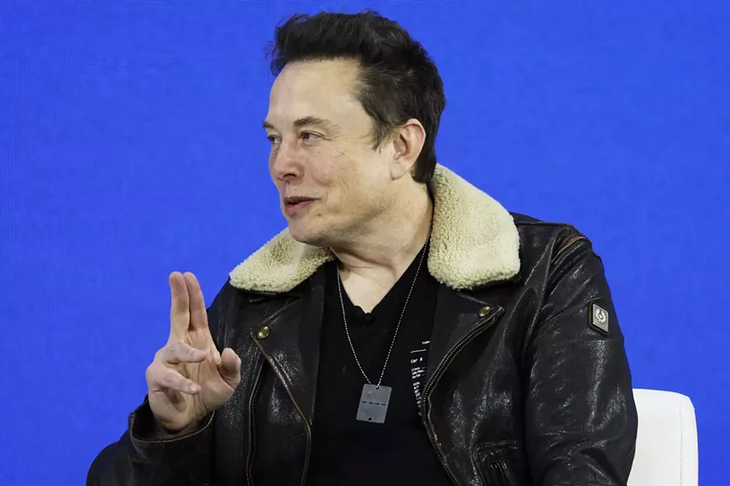 Image: Tesla CEO Elon Musk speaks during the New York Times annual DealBook summit on November 29, 2023, in New York City.