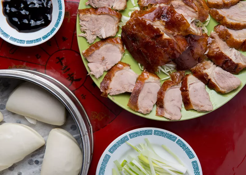 Image: Peking duck with steamed buns makes for a great family-style meal at Little Kaiping in Richardson.
