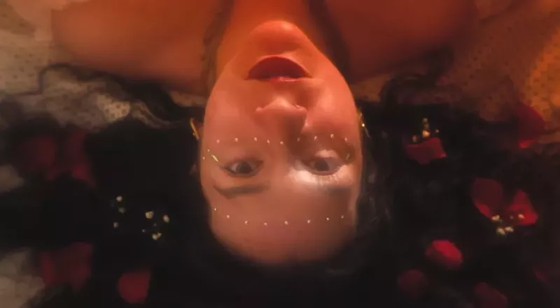 Image: Singer Yolanda Cruz's haunting love song "Sea of Faces" makes a memorable appearance in the sleeper horror movie hit Terrifier 2.