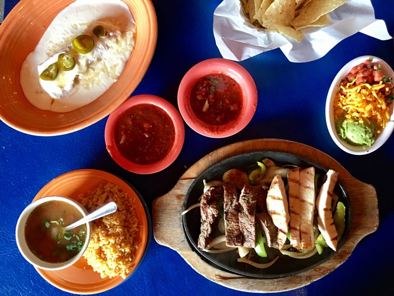 A combo platter of fajitas, grilled chicken and steak ($16.99) has the vital sides of pico de gallo, rice, charro beans and shredded cheese.