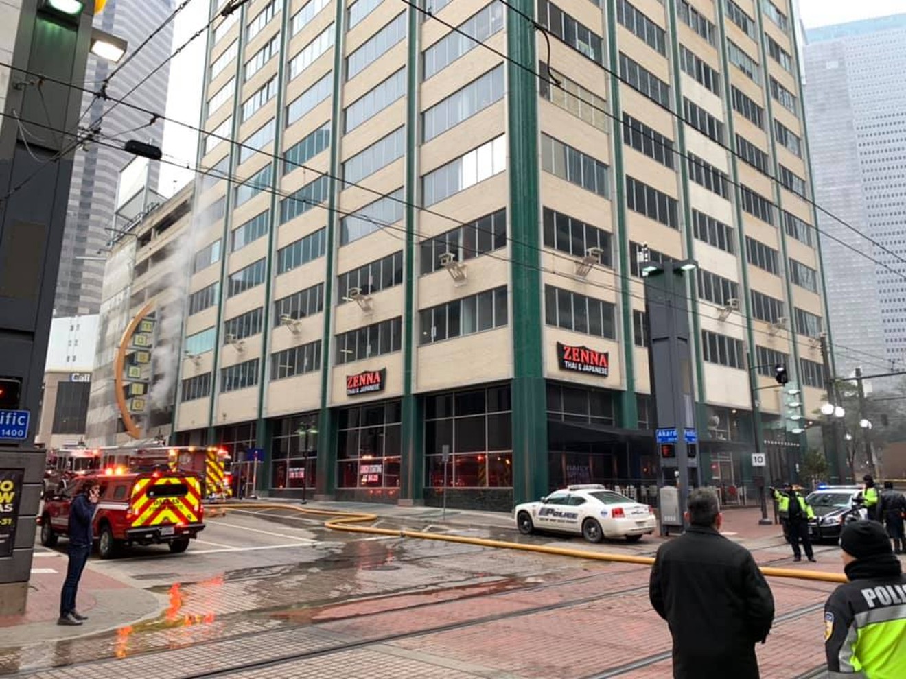 Carl Azbell, a broker at Metroplex Realty, snapped this photo of the scene downtown on Thursday as firefighters battled a blaze that started in Zenna Thai's kitchen.